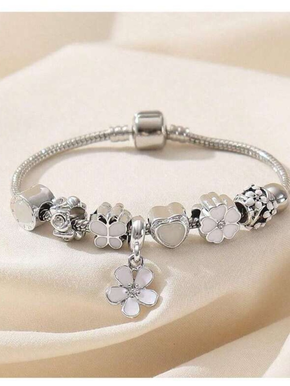 Silver Floral Charm Bracelet with White Enamel Accents